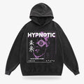 Black hoodie featuring a graphic print of a stylized face with spiral eye design and the text "HYPNOTIC FOCUS." Made from soft material, designed by Lottiee Duty, with a cozy hood and relaxed fit.